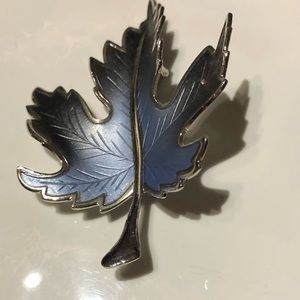 Silver and blue tone leaf pin